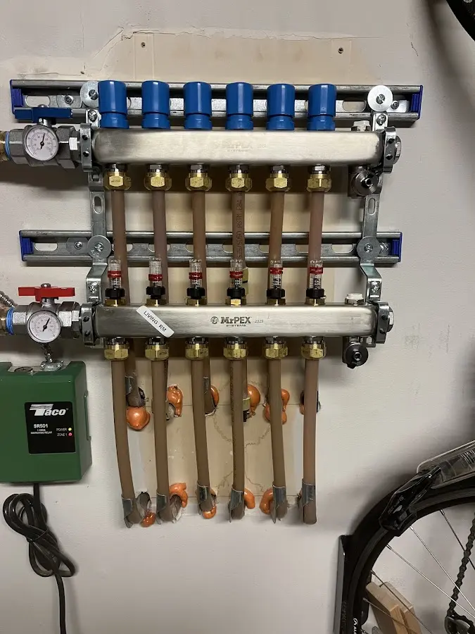 Plumber performing Gas Line Installation at a residential property in Pineville